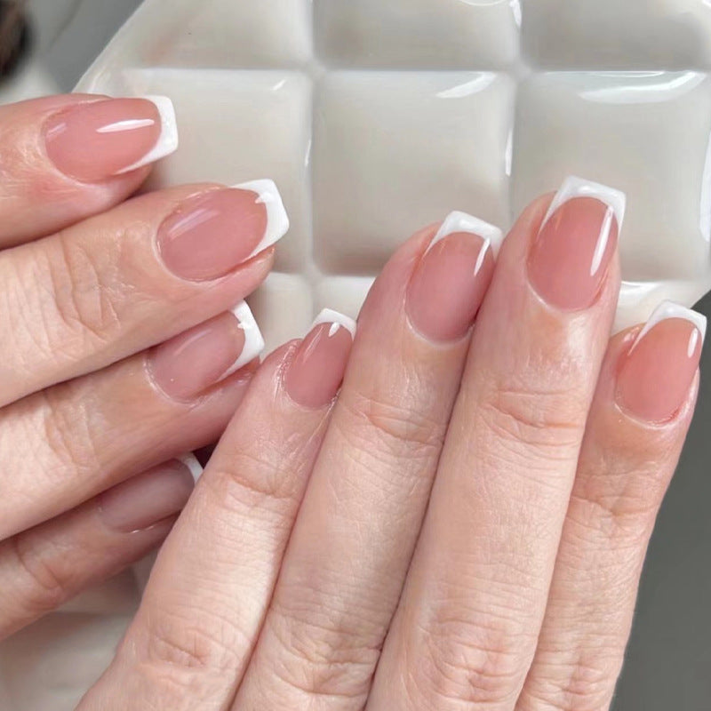 Classic French Tip Short Coffin | Short Nails – Ellie Vincy ... The Classic French Tip Short Coffin nails by Ellie Vincy are a timeless and elegant choice for those with short nails. The subtle white tips on the coffin-shaped nails add a touch of sophistication to any look, making them perfect for any occasion.