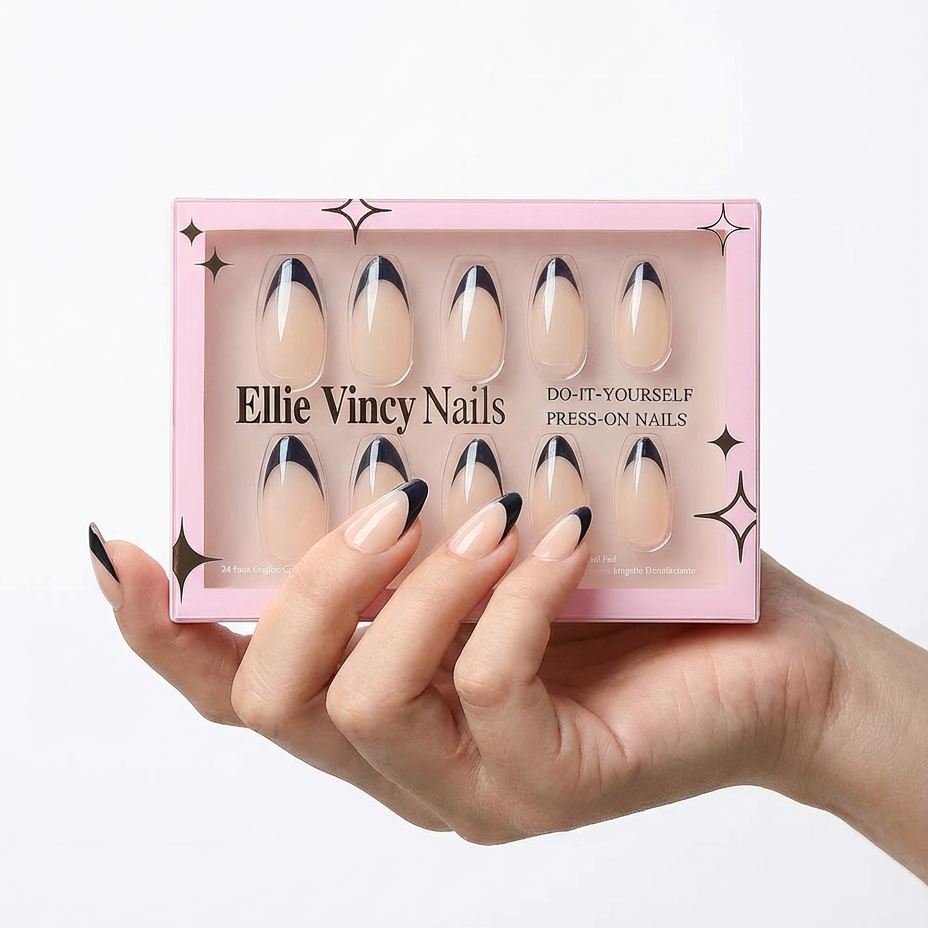 Hand holding a box of Ellie Vincy Nails press-on nails with a white background